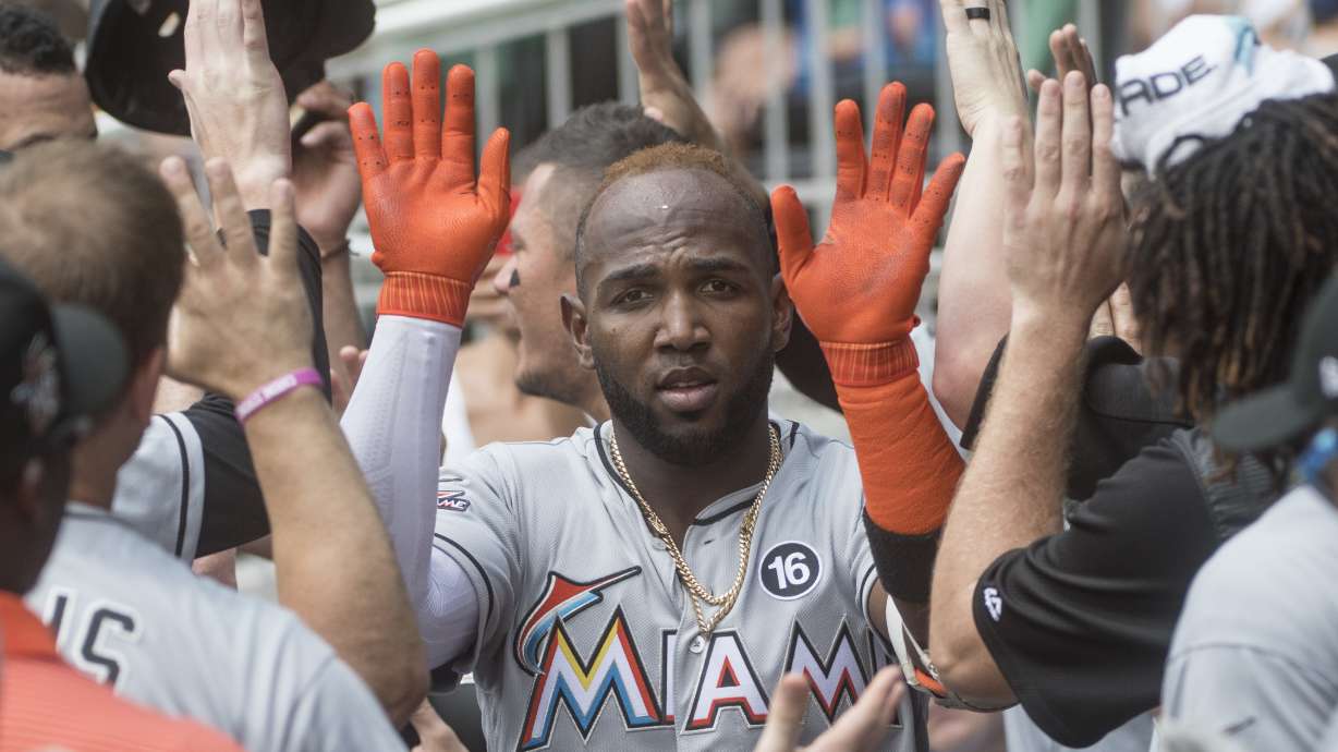 Urena, Ozuna help Marlins avoid 3-game sweep