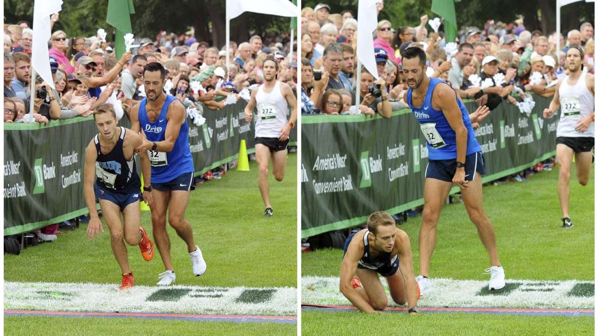 Struggling runner crosses finish line with competitor's help