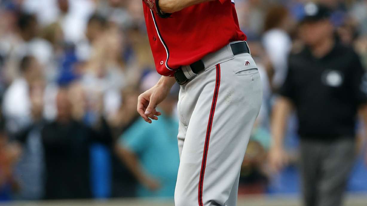 Wieters hits grand slam as Nationals beat Cubs 9-4