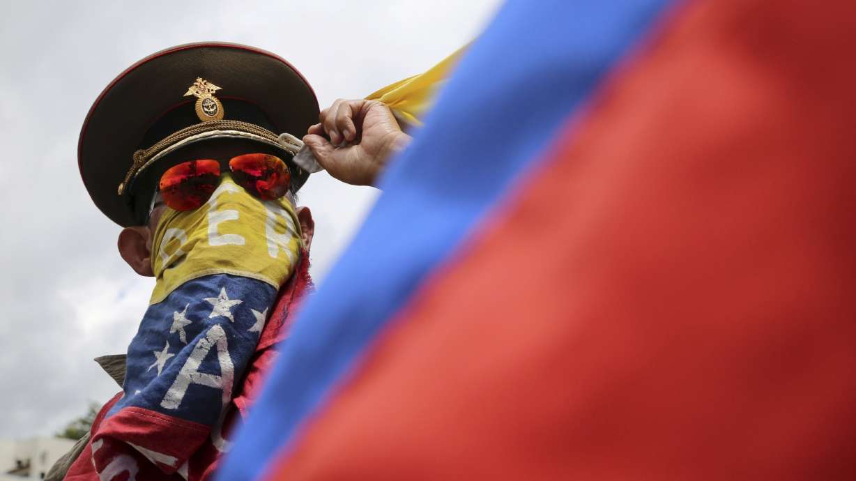 Dueling factions in Venezuela stake claims at power