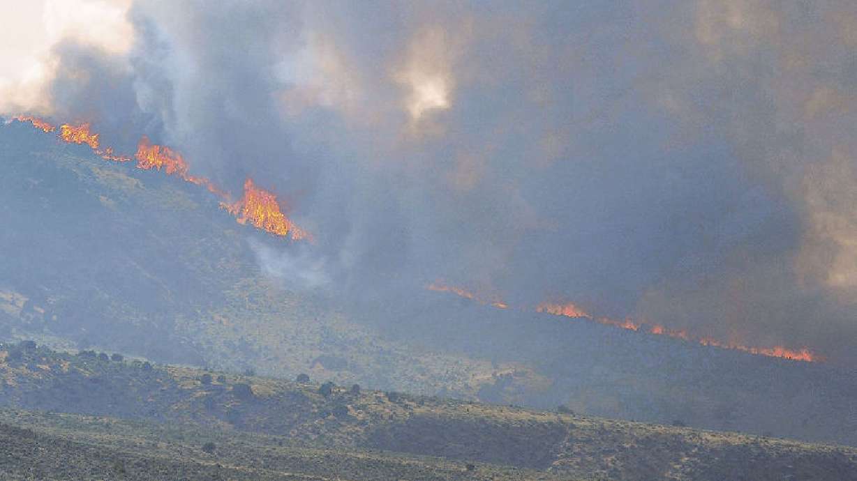 Crews brace for 50mph winds in fight against giant blaze near Pocatello