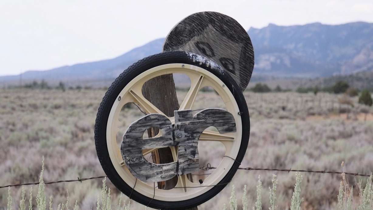 This wheel with the letters "ER" attached along with a picture of a man peeking from behind is art commemorating nearby Wheeler Peak. (Photo: John Hollenhorst, KSL TV)