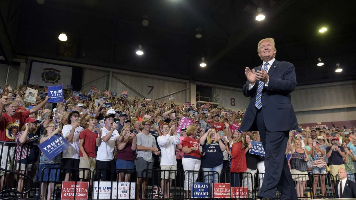 Trump appeals to loyalists as support slips, agenda stalls