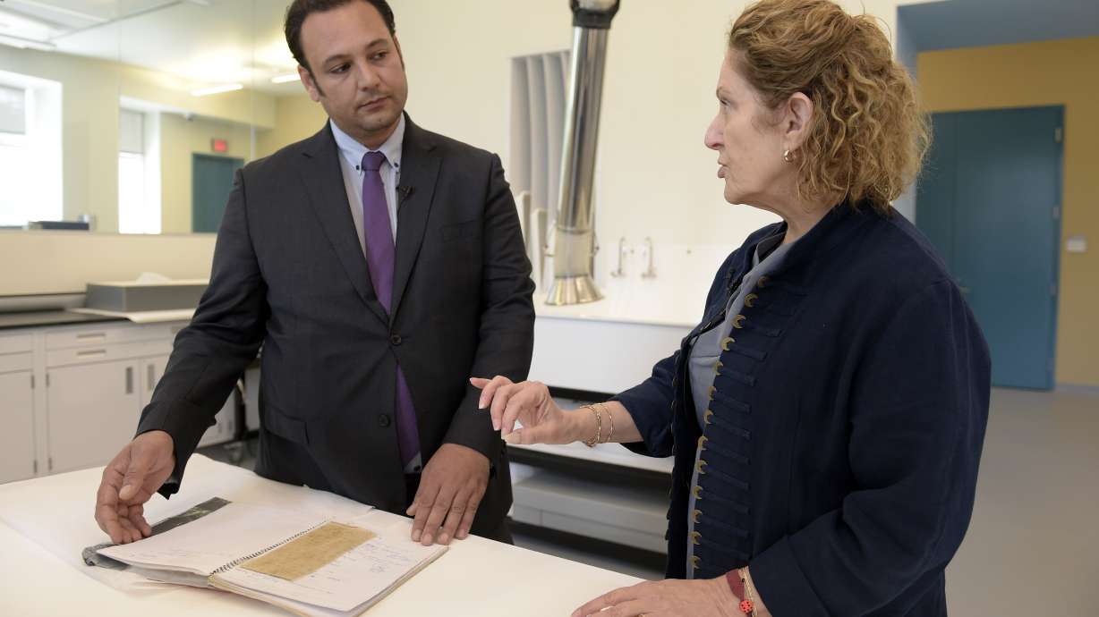 Syrian activist gives scraps with prisoners' names to museum