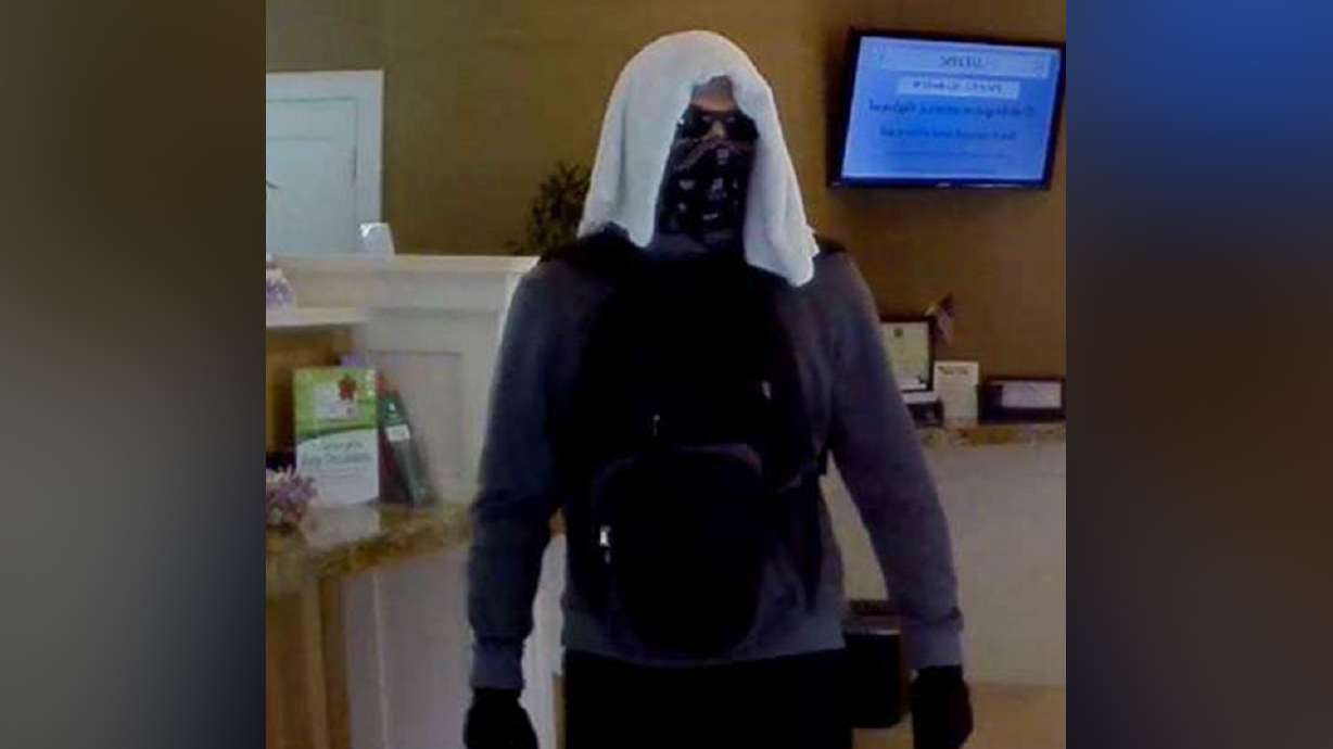 Police seek man in connection to armed bank robbery in Midway