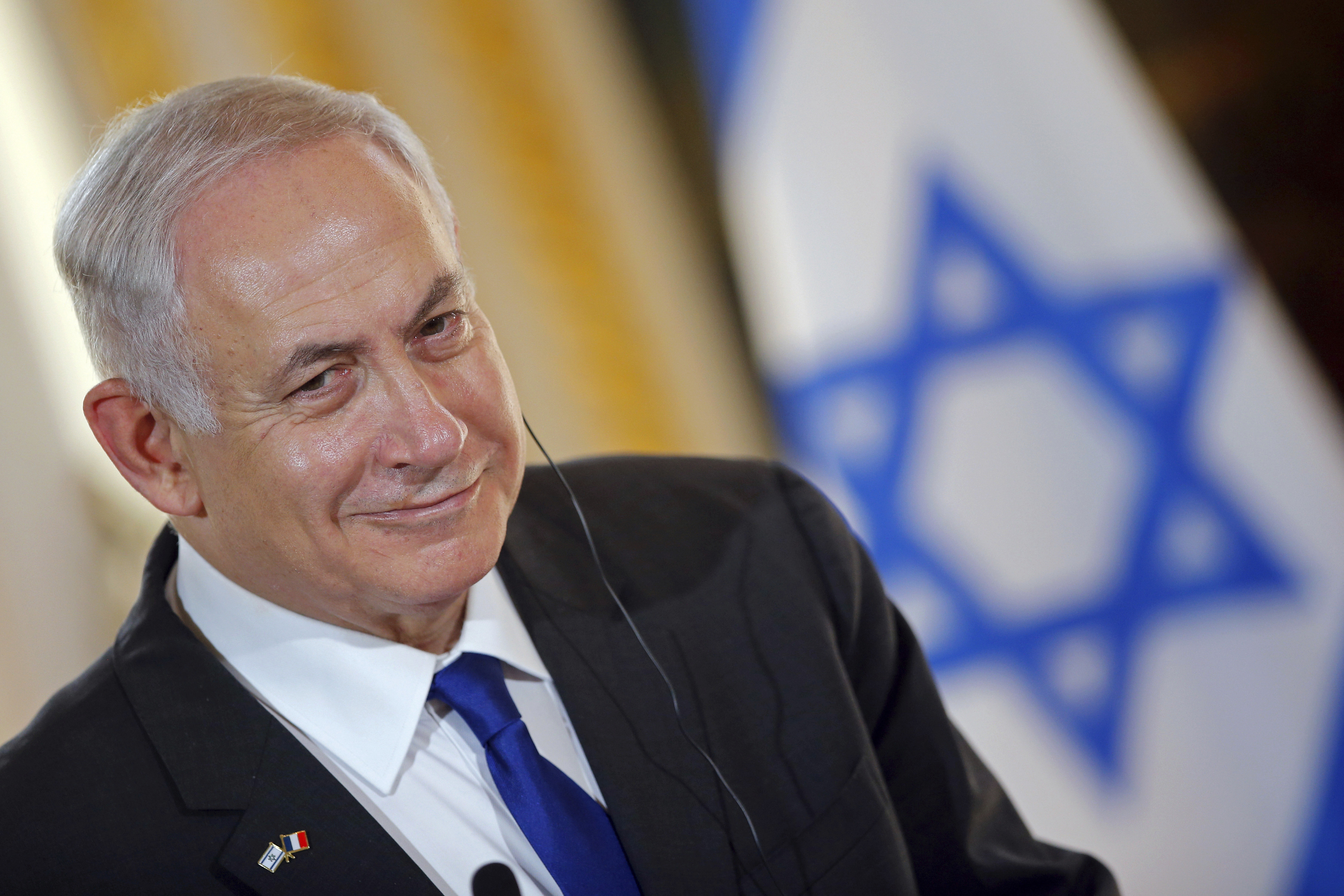 The Latest: Netanyahu delivers fiery speech at rally