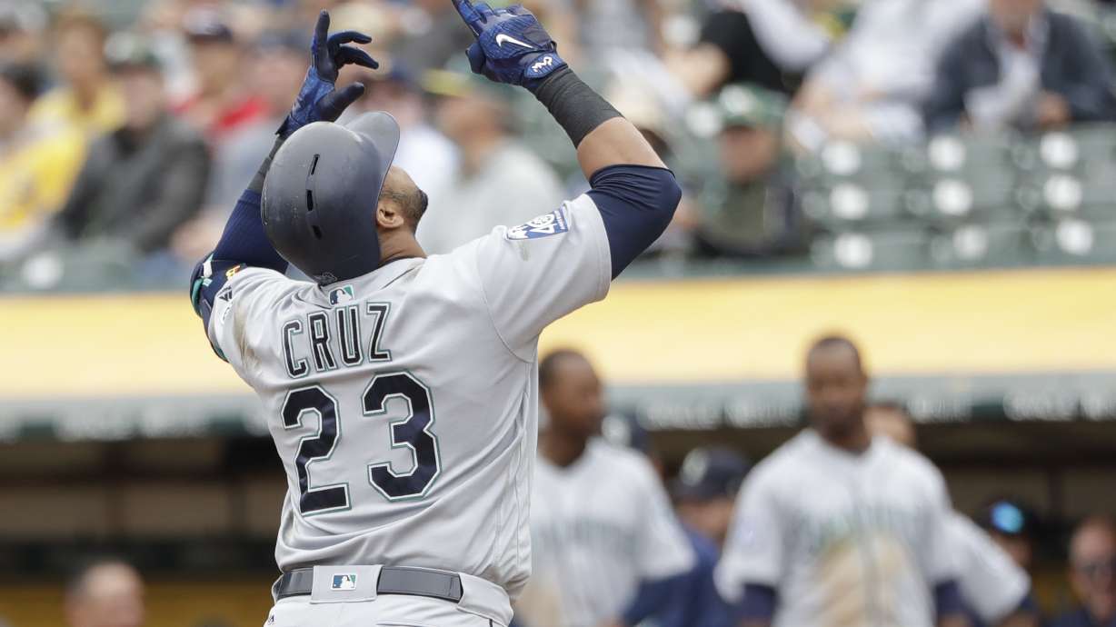 Cruz homers twice to power Mariners past A's 6-3