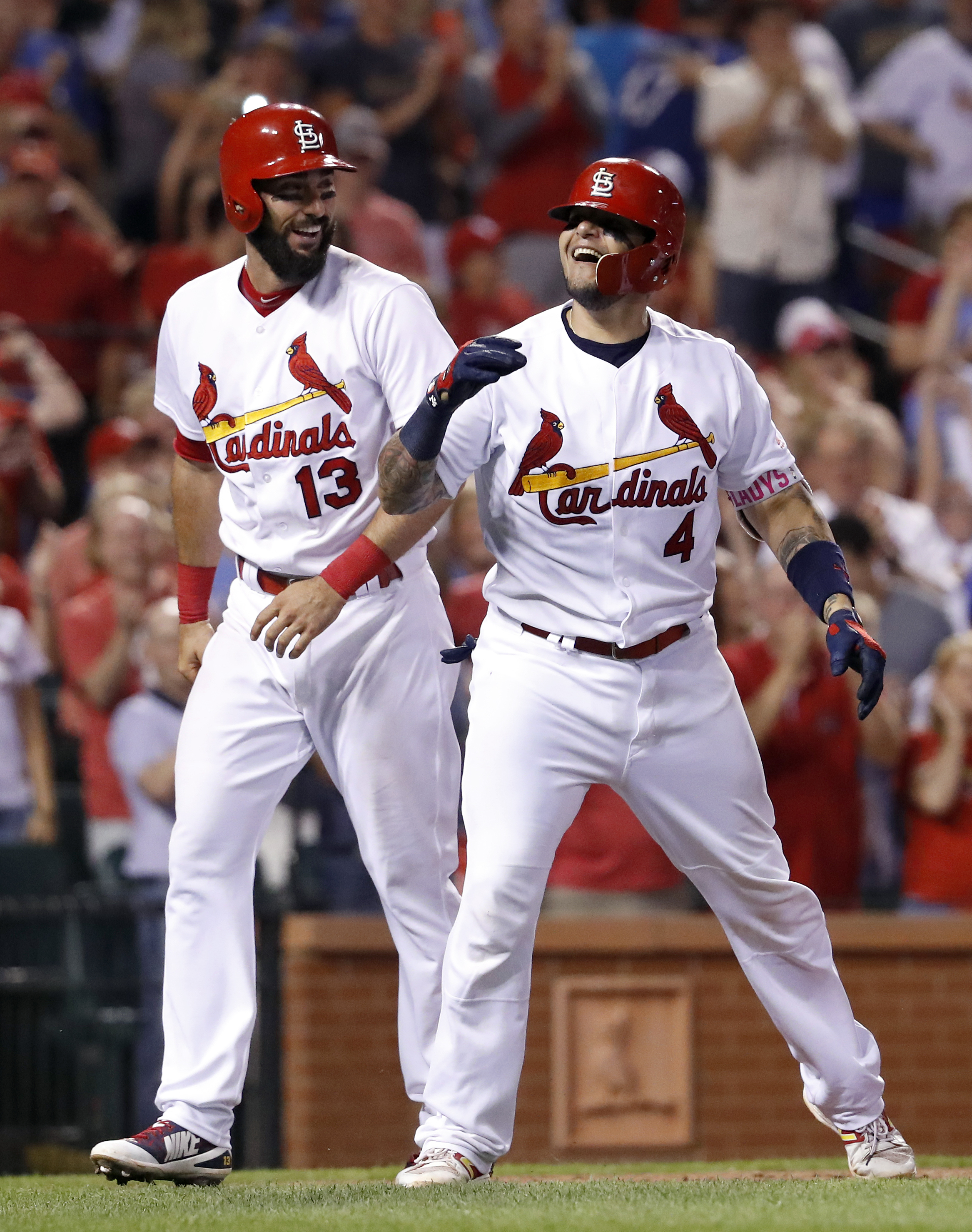 Rally cat: Molina slam after cat runs on field leads Cards