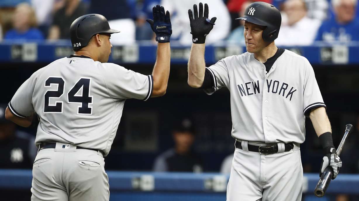 Frazier, Yanks overcome shaky Tanaka, beat Blue Jays 11-5
