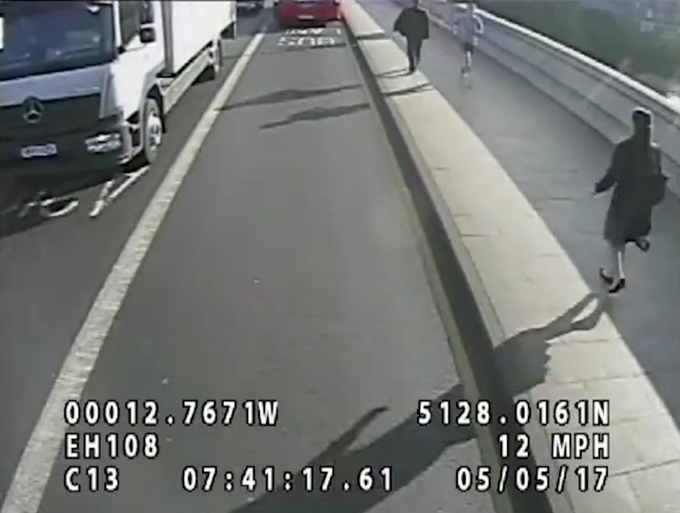Man arrested after jogger pushed woman in path of London bus