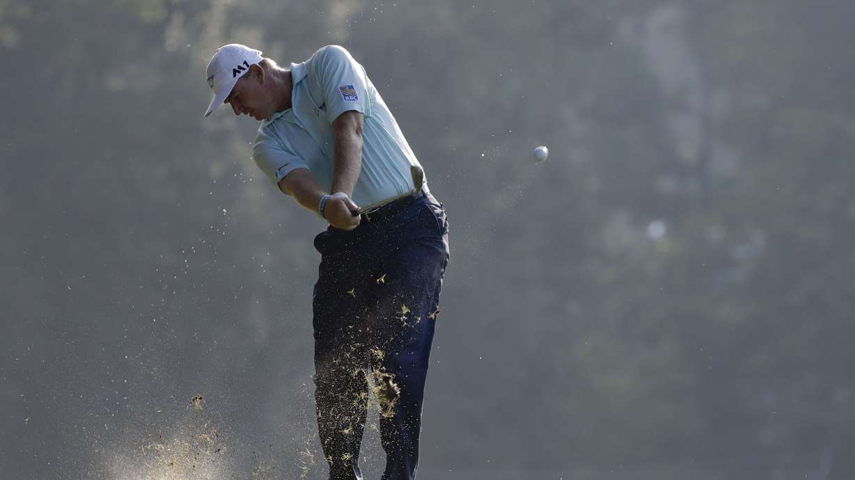 The Latest: Kisner joins Olesen in share of the lead at PGA