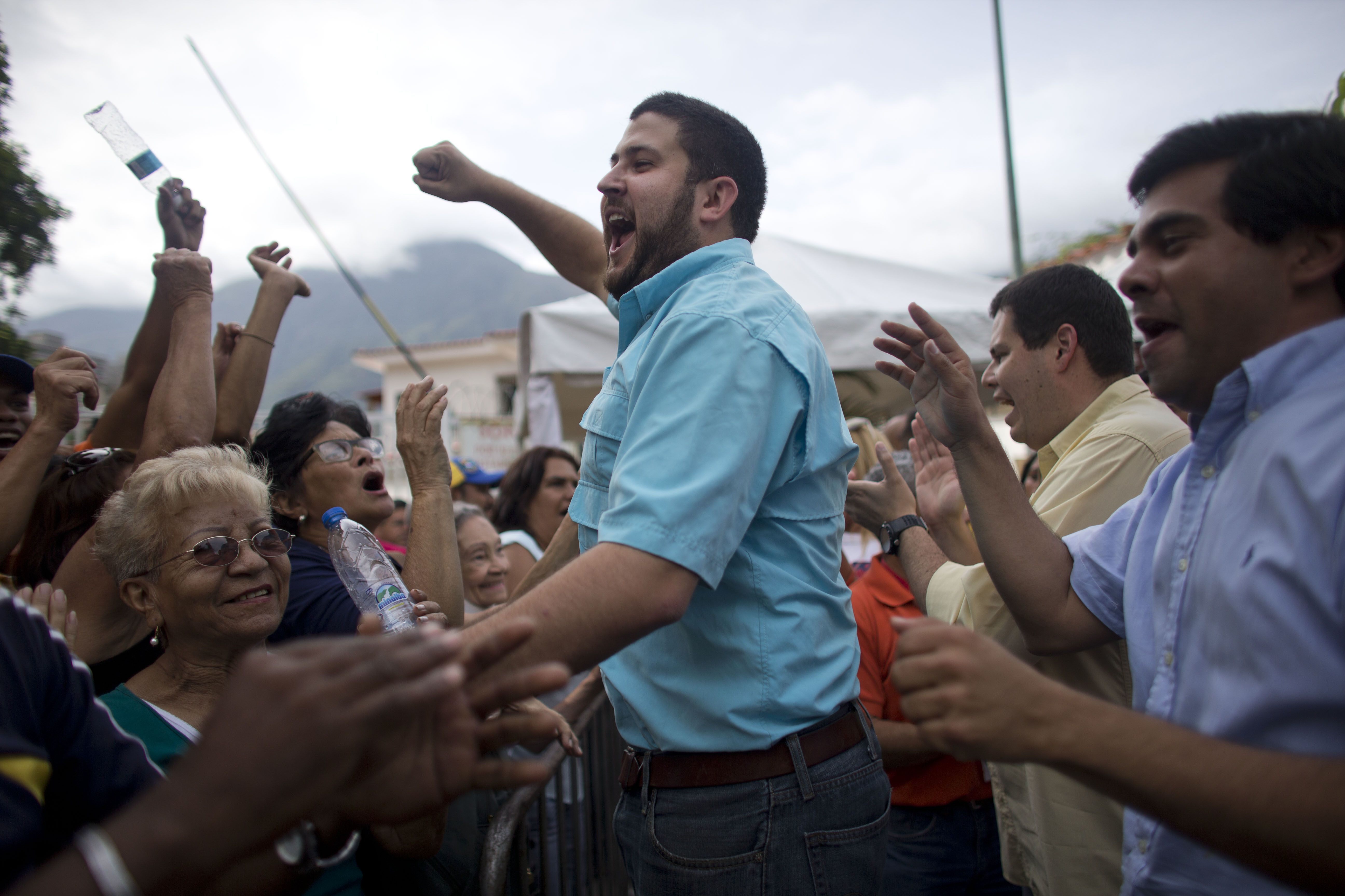 The Latest: Venezuelan leader wants meeting with Trump