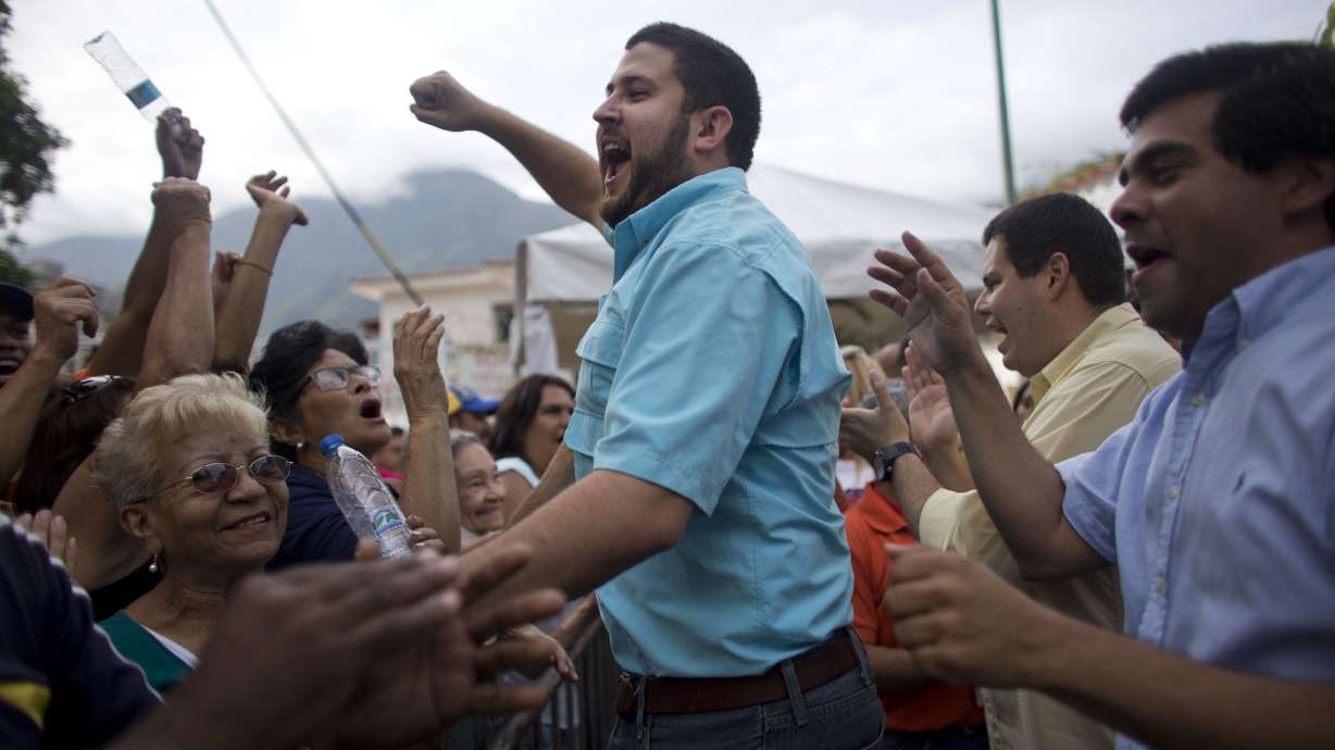 The Latest: Venezuelan leader wants meeting with Trump