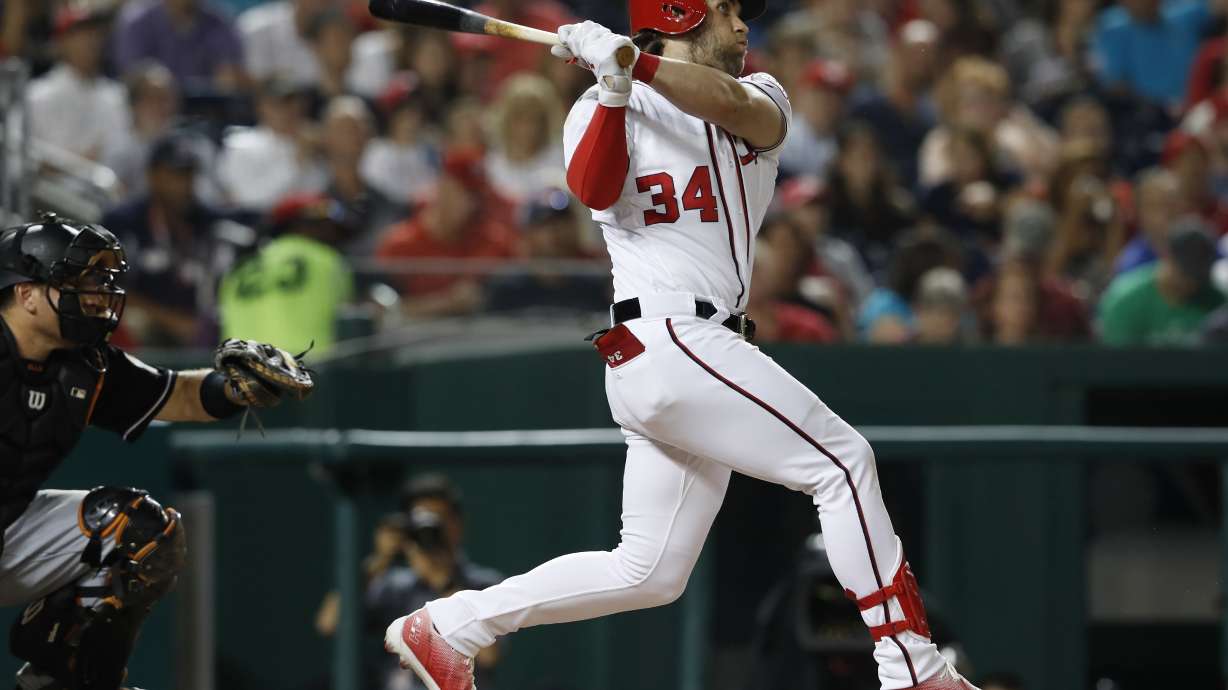 Goodwin's homer in 8th lifts Nationals over Marlins 3-2