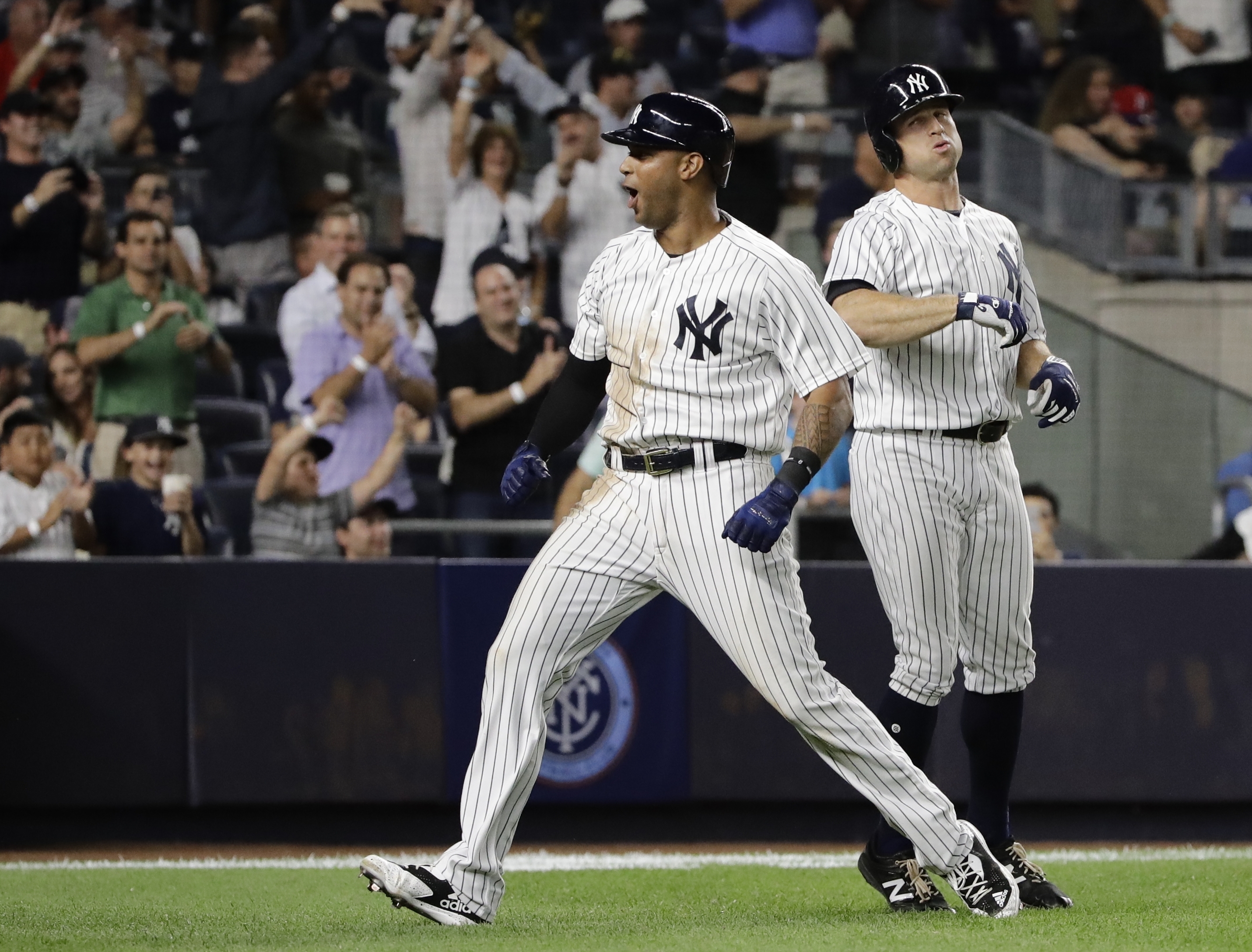 Hicks sparks Yanks with bat, arm, stopping Red Sox streak