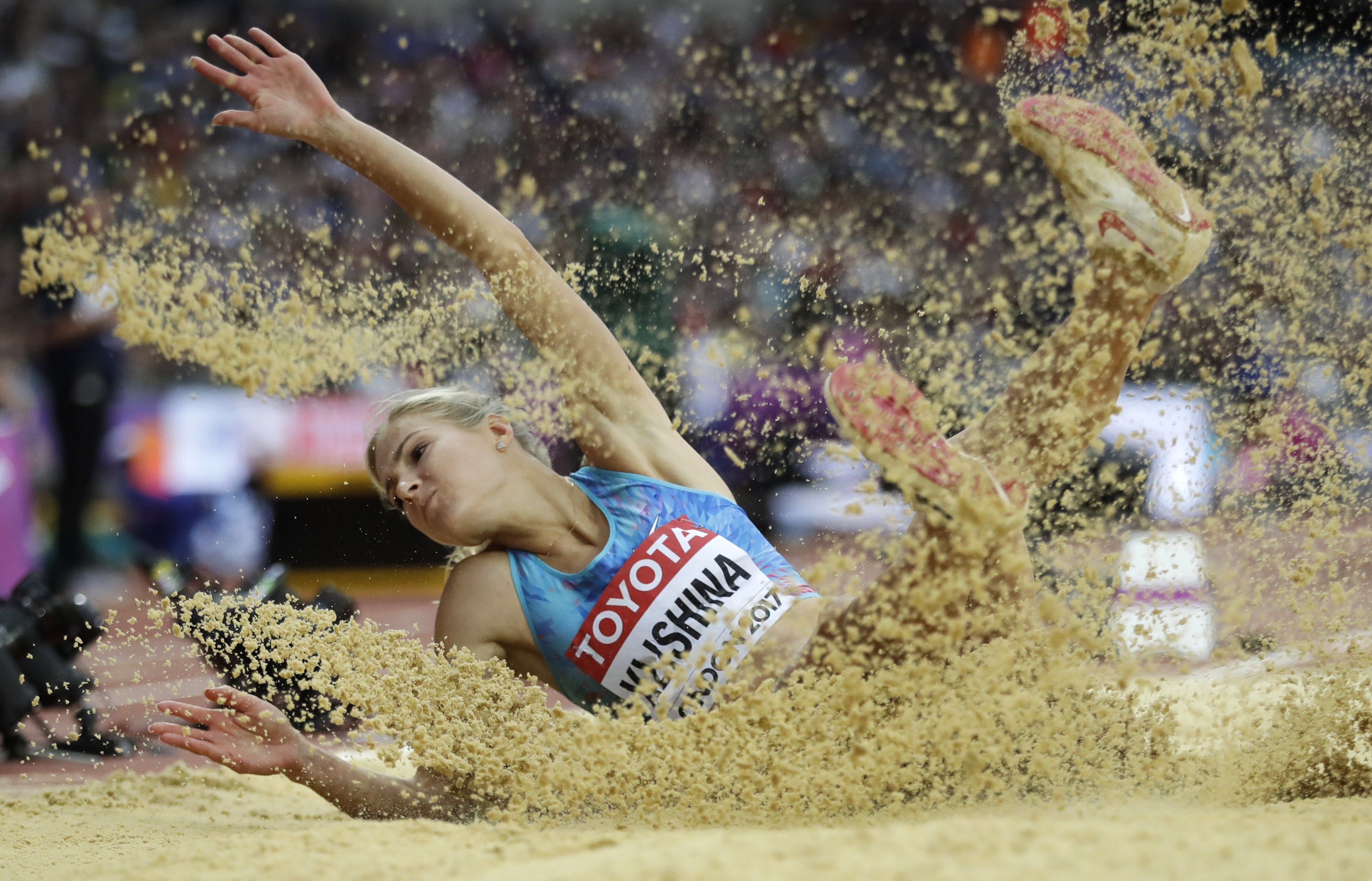 The Latest: Jamaican team doctor says Bolt had a cramp