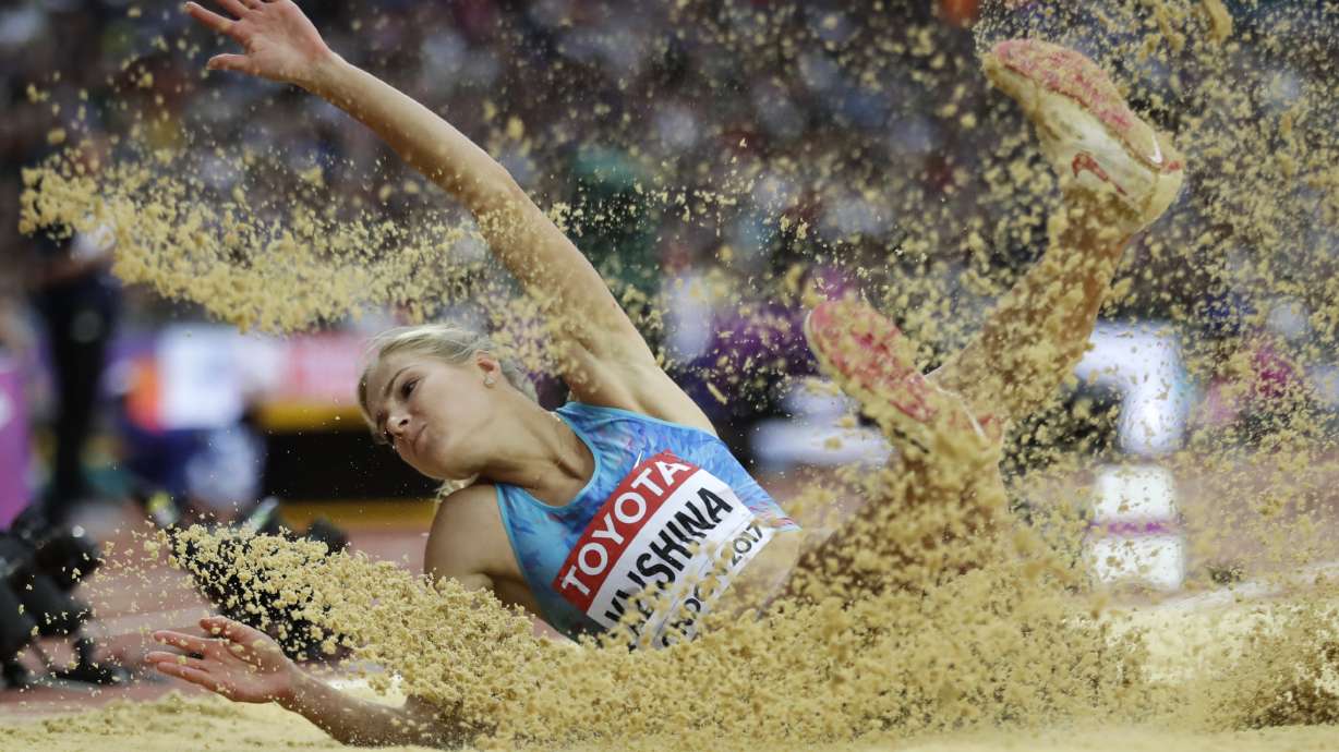 The Latest: Jamaican team doctor says Bolt had a cramp