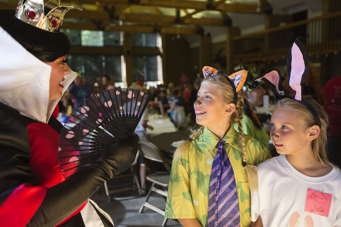 Andrea VanderMeyer, left, talks to "Zootopia" cabin's Alice Anderson, 10, and Riley Chave, 9, at the burn camp's Disney-themed red carpet event in Salt Lake City on Sunday, Aug. 13, 2017. (Photo: Kelsey Brunner, Deseret News)