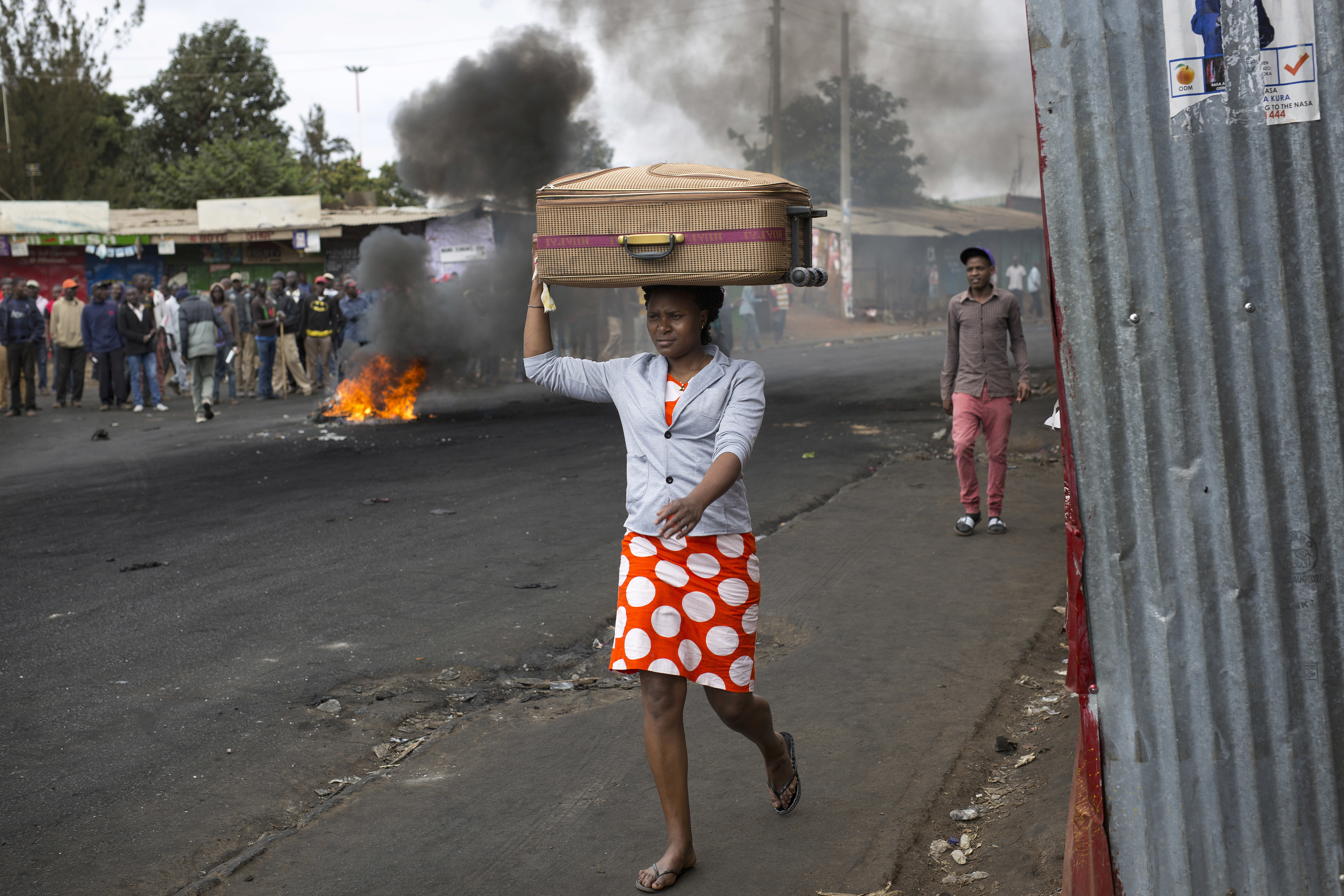 The Latest: Many Kenyans go to work despite stayaway call