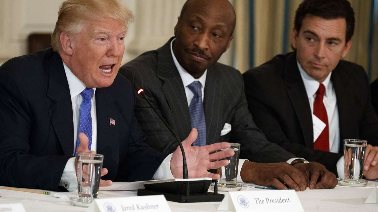 Business leaders quit Trump panel; he hits back hard