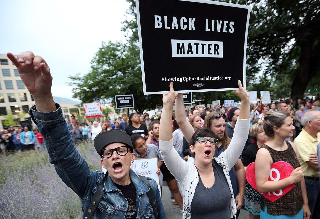 Lesley Ann Shaw and Kate Kelly cheer during a Solidarity Rally outside of the Salt Lake City and County Building in Salt Lake City, on Monday, Aug. 14, 2017. (Photo: Kristin Murphy, Deseret News)