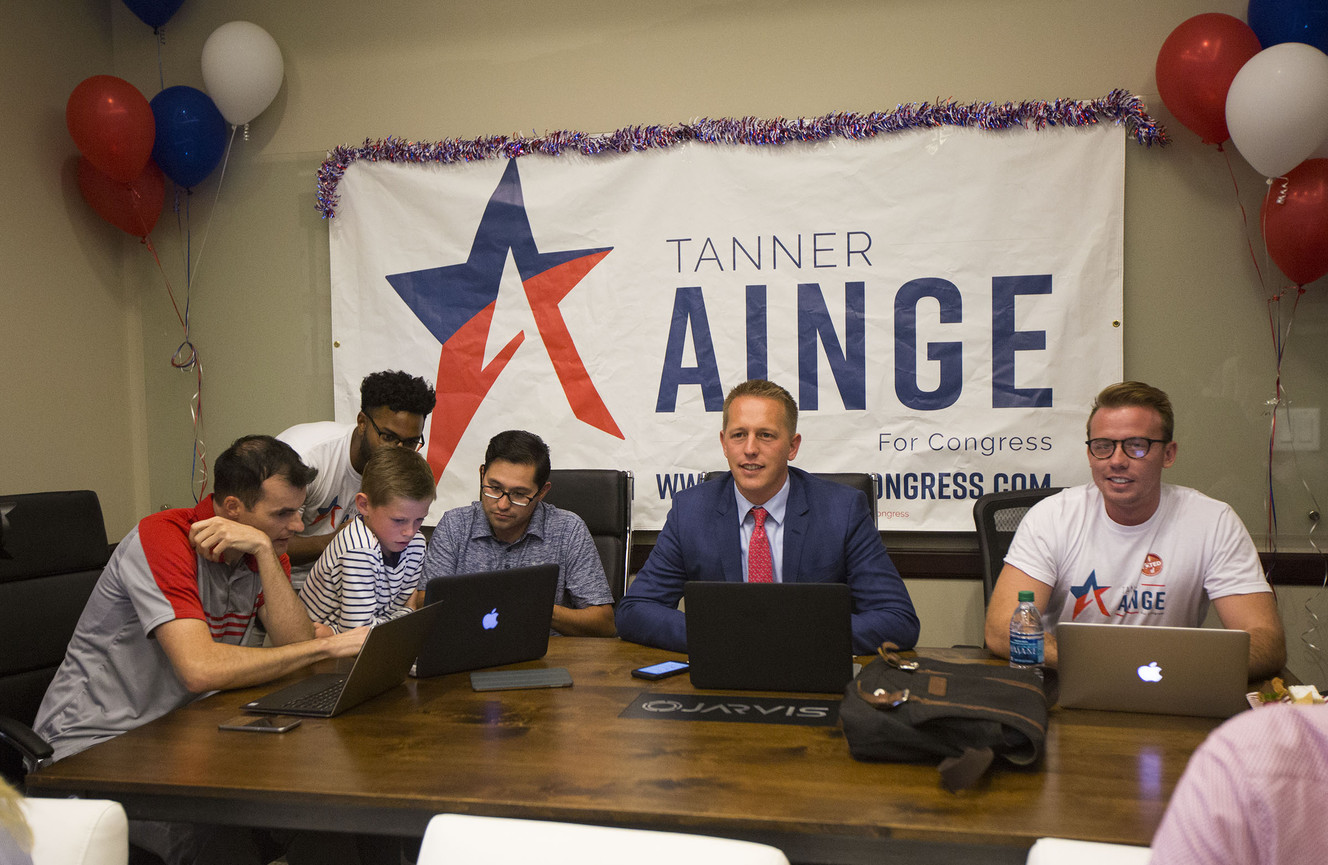 Third Congressional District candidate Tanner Ainge, right, and his family, friends and campaign staff watch intently as voting results come in on Tuesday, Aug. 15, 2017. (Photo: Kelsey Brunner, Deseret News)