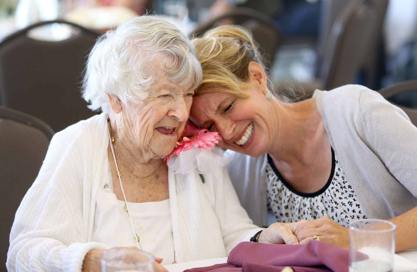 Rosemarie McCrea and her granddaughter, Emily Holmgren, laugh during the 31st Centenarian Celebration at the Viridian Event Center in West Jordan on Thursday, Aug. 17, 2017. (Photo: Kristin Murphy, Deseret News)