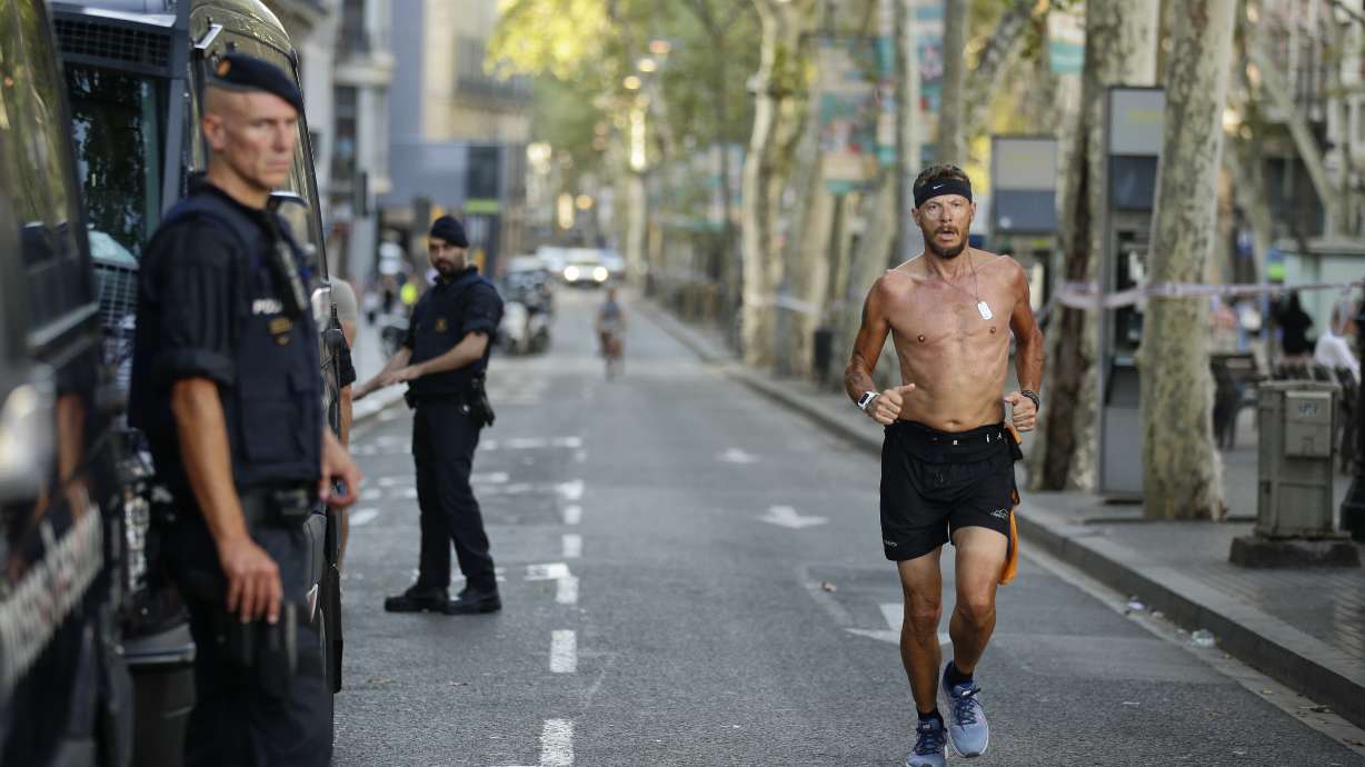 Memorials grow along site of deadly attack in Barcelona