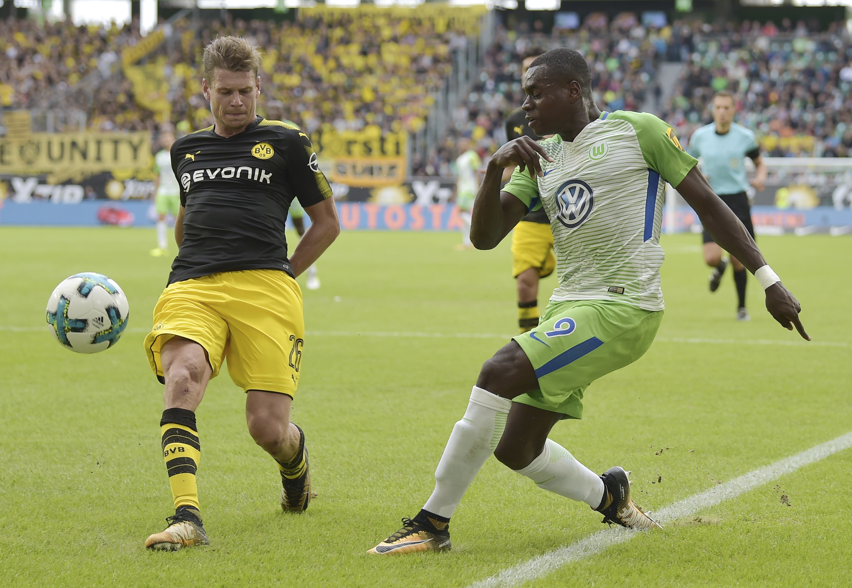 Dortmund impresses without Dembele in Bundesliga-opener