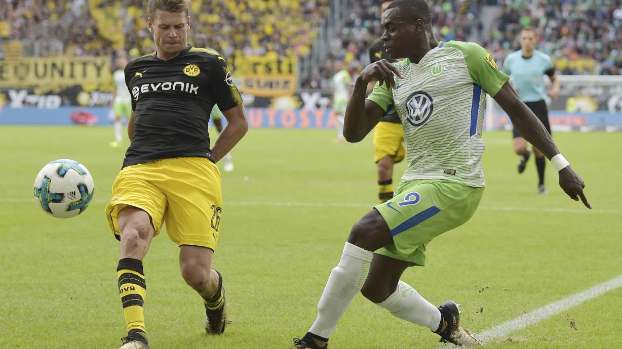 Dortmund impresses without Dembele in Bundesliga-opener