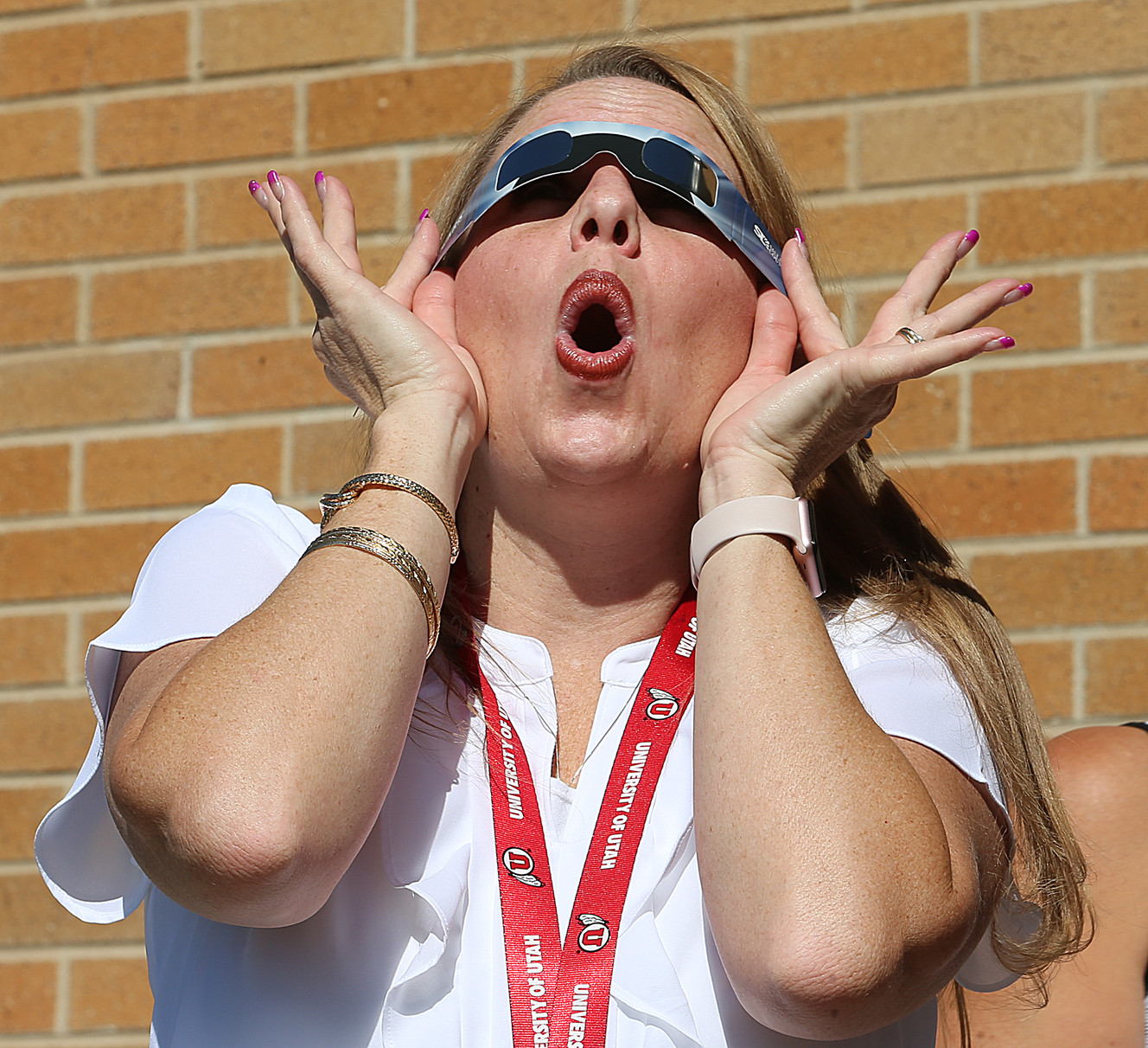Crestview Elementary Principal Teri Ann Cooper reacts as she sees the eclipse from the Salt Lake City school on Monday, Aug. 21, 2017. (Photo: Scott G Winterton, Deseret News)