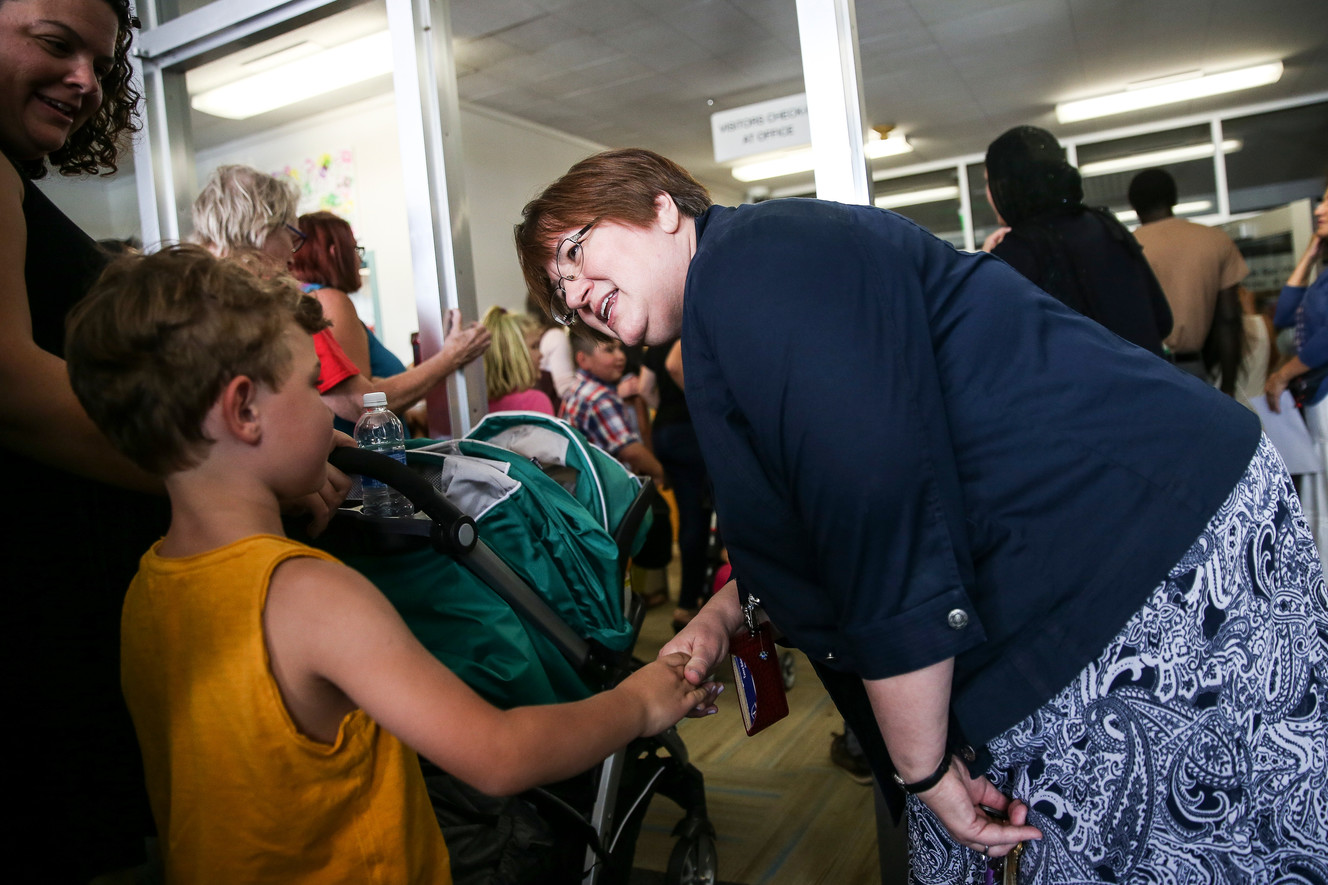 Midvalley Elementary Principal Tamra Baker greets students and their parents on back-to-school night at the Midvale school on Tuesday, Aug. 22, 2017. The school has several outdated features including the entryway, which cannot be made compliant with the Americans with Disabilities Act. Students in wheelchairs must use an alternate entry on another side of the school that is monitored by video cameras so they can be buzzed in. (Photo: Spenser Heaps, Deseret News)