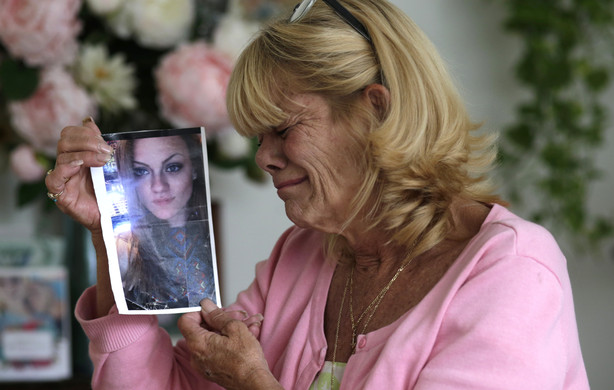In this Thursday, July 13, 2017 photo, Michelle Holley holds a photograph of her daughter Jaime Holley, 19, who died of a heroin overdose in November 2016, at her home in Fort Lauderdale, Fla. Photo: AP Photo