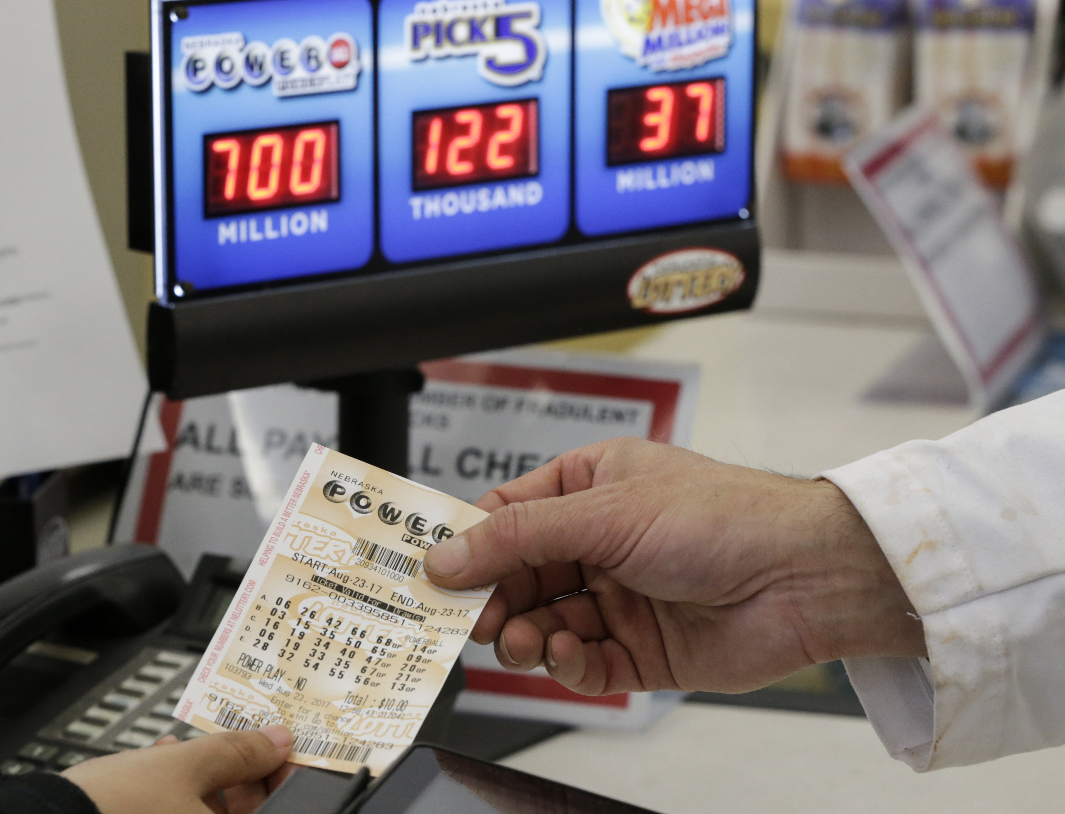 Massachusetts hospital worker claims record lottery jackpot