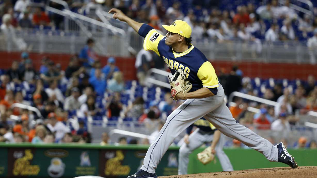 Rojas' sacrifice fly helps Marlins beat Padres 2-1 in 11