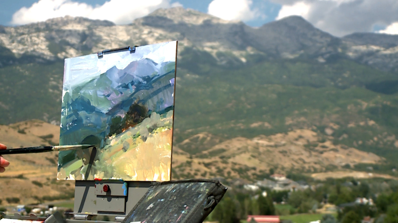 Bryan Mark Taylor uses his easel to paint a landscape near his home in Alpine on Tuesday, Aug. 15, 2017. (Photo: Ray Boone)
