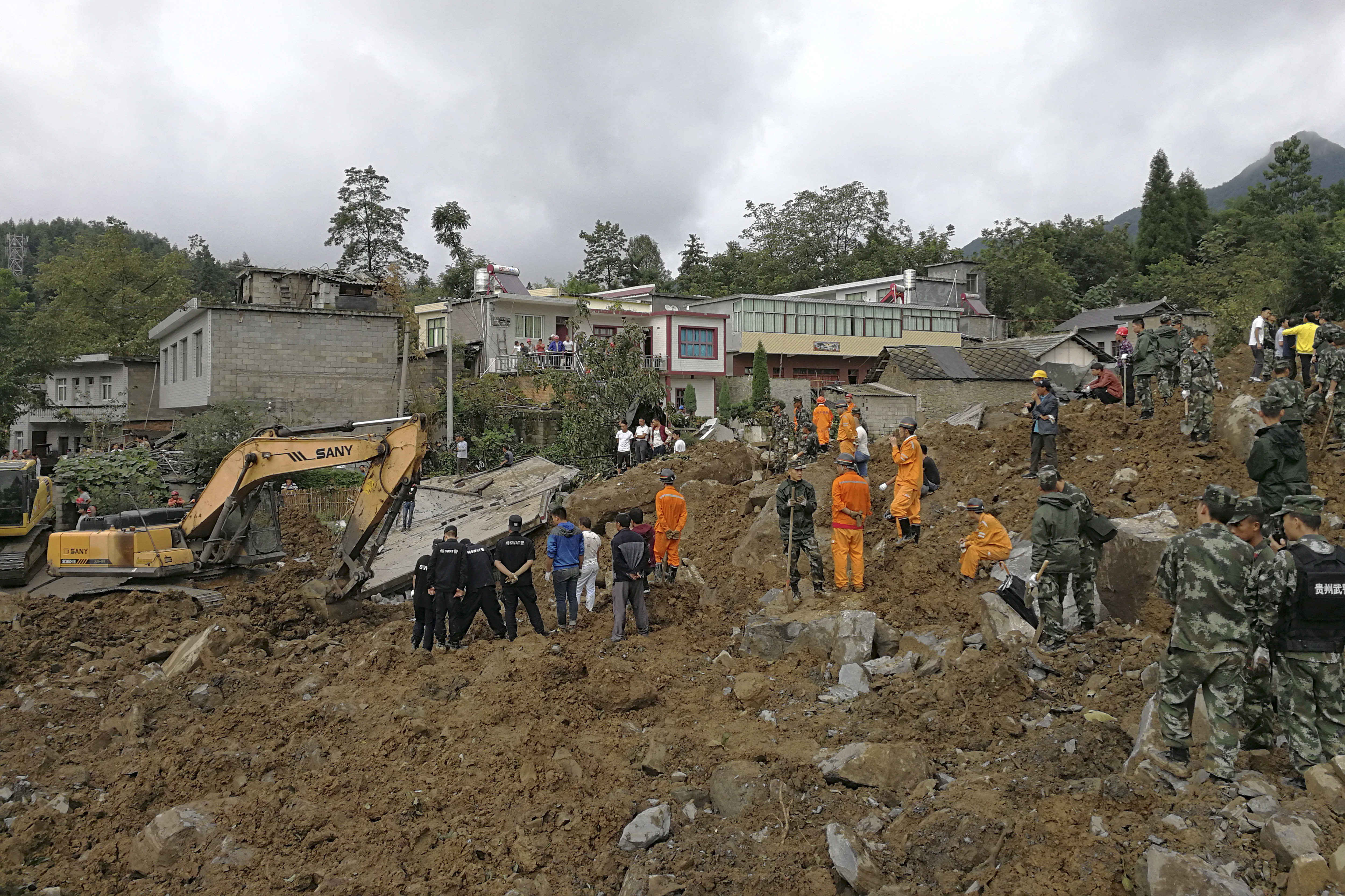 Government says 1 dead, 37 missing in south China landslide