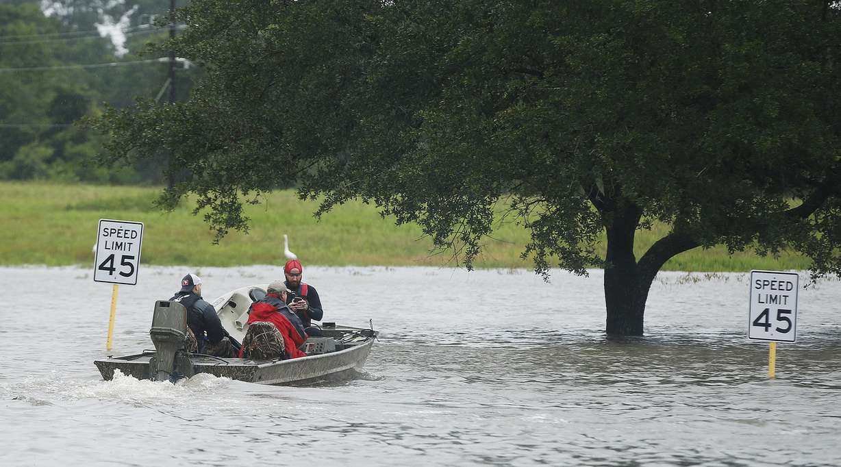 Rescuers transport evacuees during Tropical Storm Harvey in Houston on Tuesday, Aug. 29, 2017. (Photo: Jeffrey D. Allred, Deseret News)