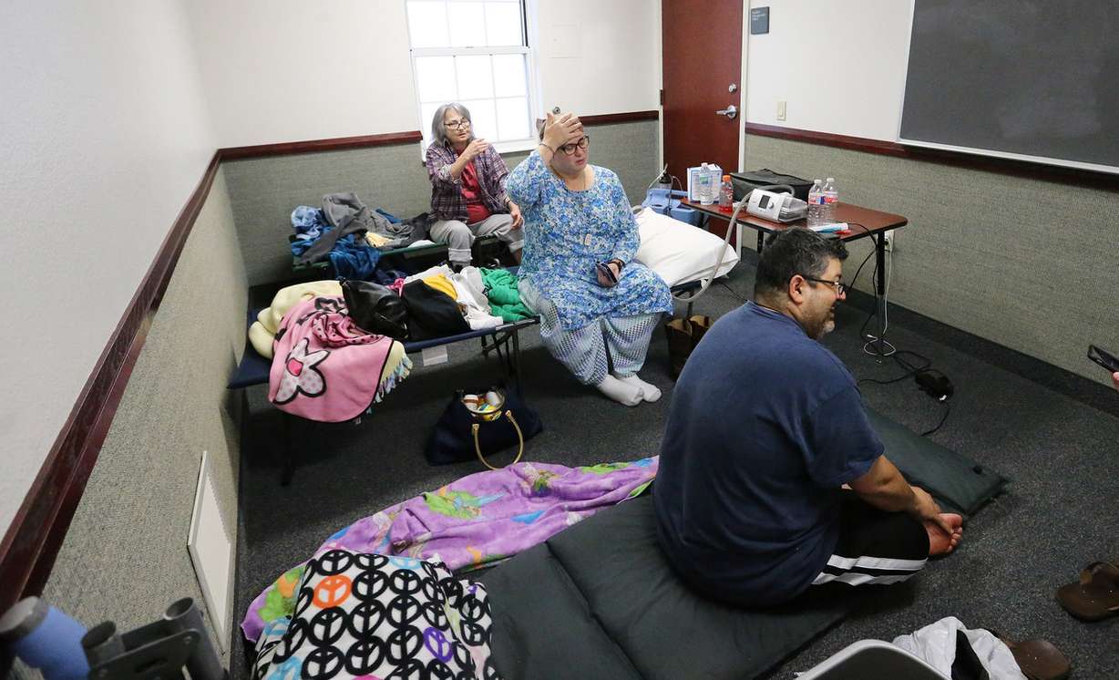 Hassan and Mary Mohammed and Mary's mother, Mary Tucker, stay in a classroom in an LDS Church stake center during Tropical Storm Harvey in Houston on Tuesday, Aug. 29, 2017. (Photo: Jeffrey D. Allred, Deseret News)