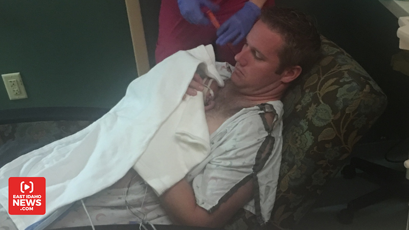 Kaio Doxey Sr. held his son for the first time a week and a half after he was born. (Photo: Courtesy Doxey family)