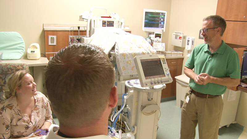 Dr. Cheatham visits with Jessica and Kaio Doxey at EIRMC. (Photo: Nate Eaton, EastIdahoNews.com)