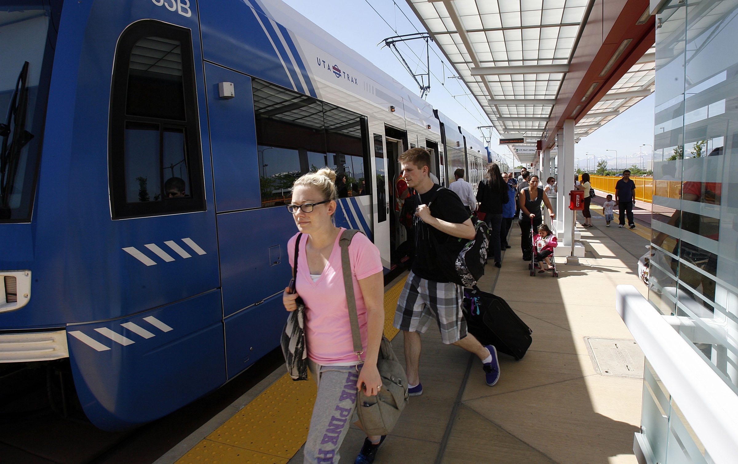 Passengers arrive by TRAX train at Salt Lake City International Airport on May 13, 2013. The new airport station is nearing completion, according to UTA.