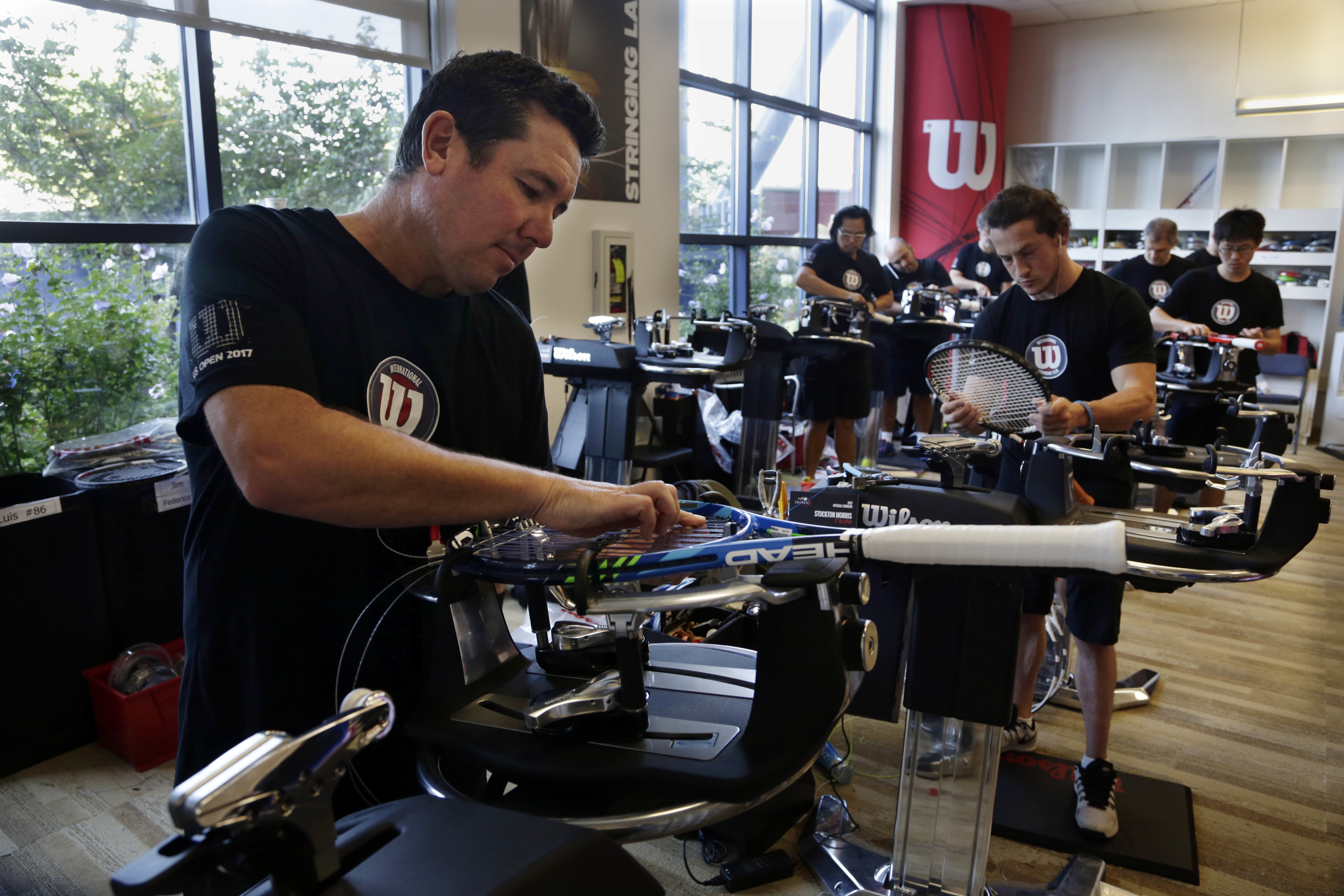 For US Open racket stringers, lots of tension, little thanks