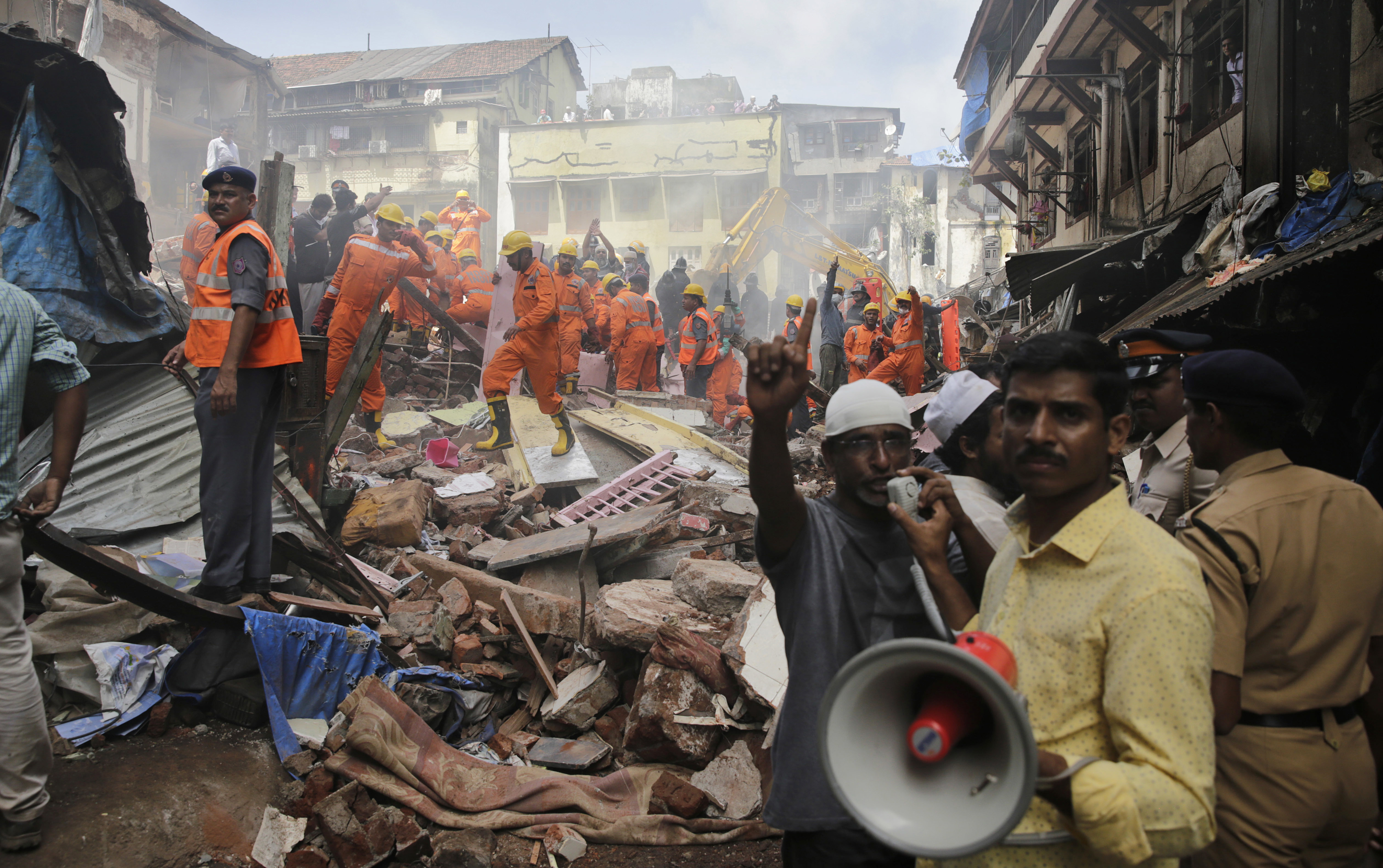 Rescuers end search at collapsed Mumbai building; 33 dead