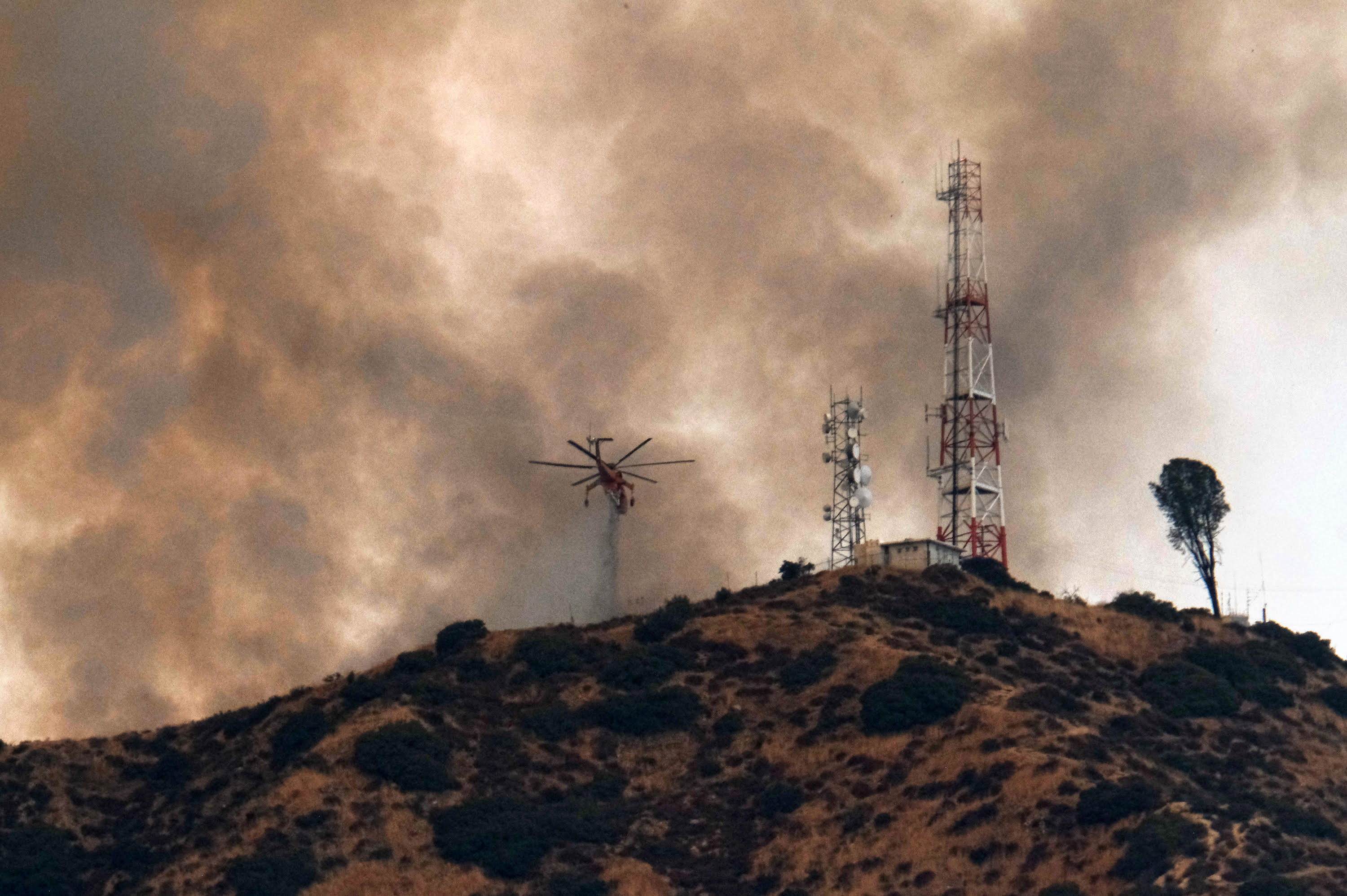 The Latest: California wildfire reaches giant sequoia grove