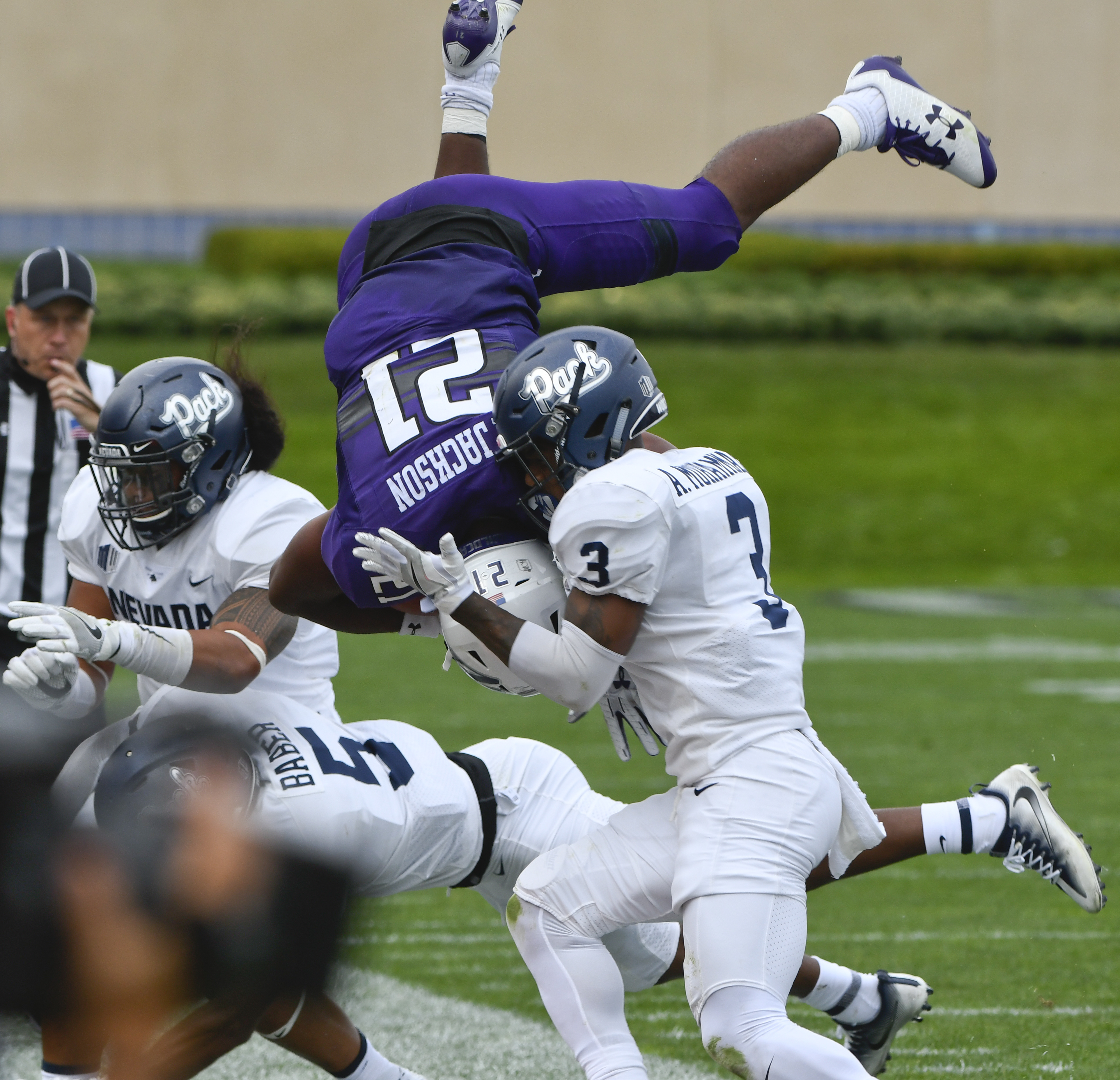 Thorson's late TDs lift Northwestern over Nevada 31-20
