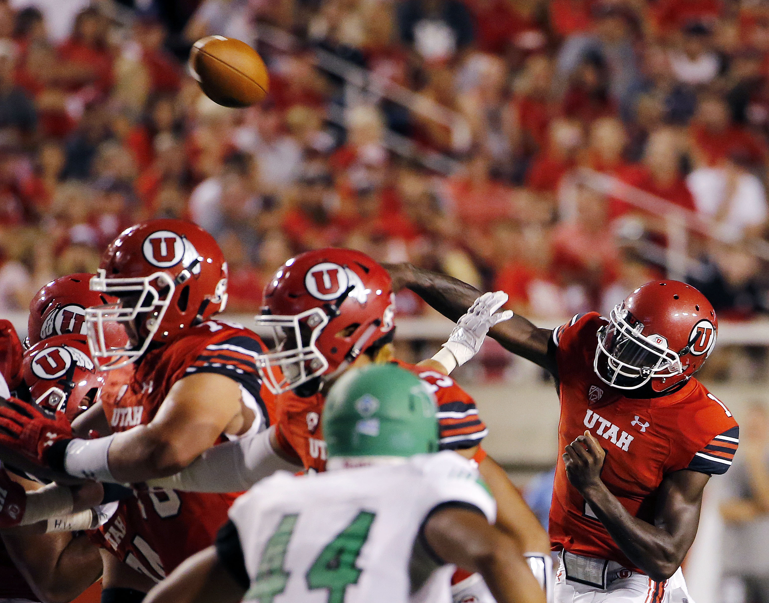 Utah Utes quarterback Tyler Huntley passes the ball against North Dakota during NCAA football at Rice-Eccles Stadium in Salt Lake City on Thursday, Aug. 31, 2017. (Photo: Ravell Call, Deseret News)