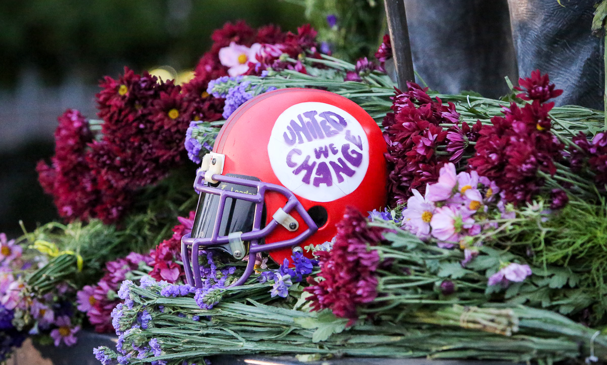 Jared Stewart, left, Colin Green, University of Utah seniors, and Nicholas Huey, Brigham Young senior, place a sign at the foot of the Brigham Young Statue at the Brigham Young University campus in Provo, on Tuesday, Sept. 5, 2017. The Climate Campaign consists of students from Utah and BYU who believe climate change awareness is necessary and can be had by diverse groups. (Photo: Adam Fondren, Deseret News)