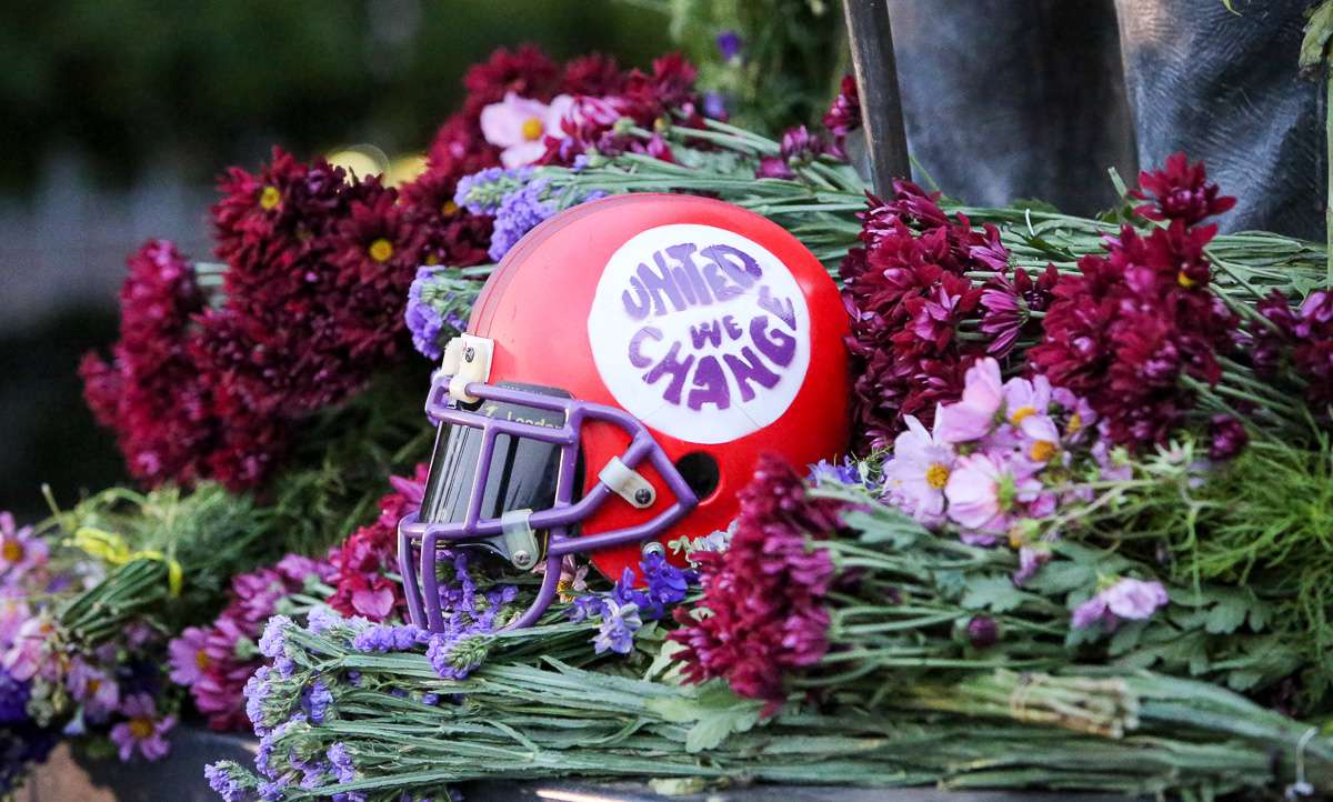Jared Stewart, left, Colin Green, University of Utah seniors, and Nicholas Huey, Brigham Young senior, place a sign at the foot of the Brigham Young Statue at the Brigham Young University campus in Provo, on Tuesday, Sept. 5, 2017. The Climate Campaign consists of students from Utah and BYU who believe climate change awareness is necessary and can be had by diverse groups. (Photo: Adam Fondren, Deseret News)