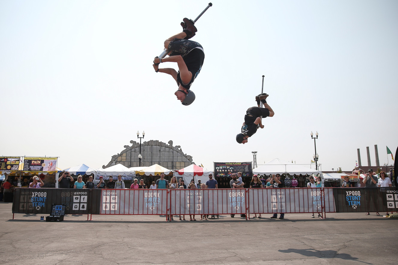 Biff Hutchison and Dan Mahoney, part of the XPOGO Stunt Team, put on a show on opening day of the Utah State Fair at the Utah State Fairpark in Salt Lake City on Thursday, Sept. 7, 2017. (Photo: Spenser Heaps, Deseret News)
